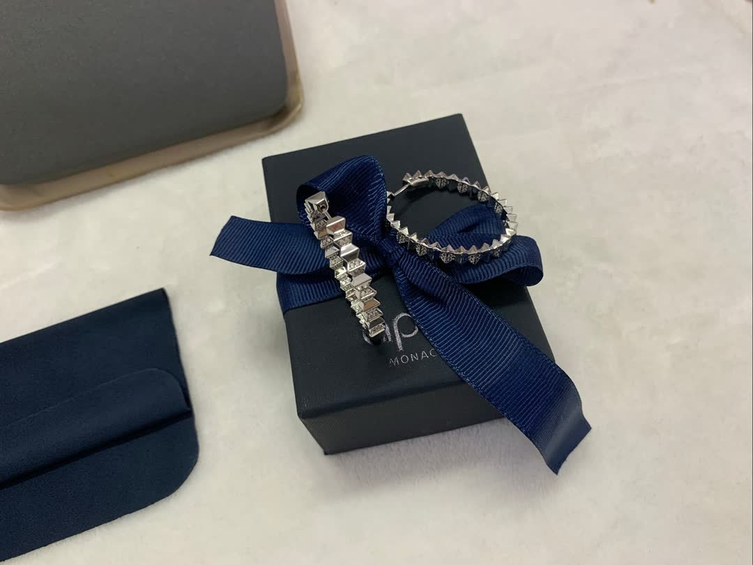 APM Monaco Elegant Silver Hoop Earrings with Diamond Accents